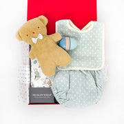 This cute hamper for the warmer weather ahead features a sweet and practical selection of gifts for a new arrival. included is a handy a cotton nappy cover and&nbsp; matching bib in duck egg blue dot.&nbsp; For swaddling a soft muslin wrap has been included and for cuddles and play the adorable Robbie Bear.&nbsp; Also included a cute wooden egg rattle, perfect for little hands to hold and shake.